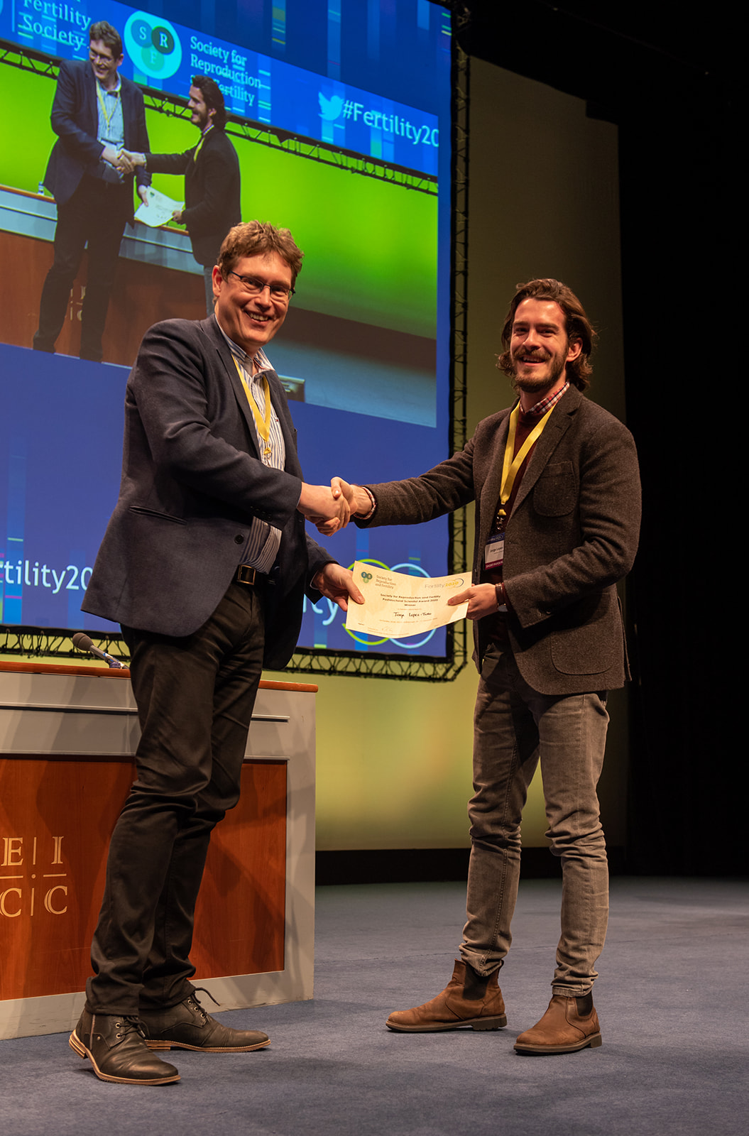 Jorge Lopez-Tello being presented with the 2019 SRF Postdoctoral Prize