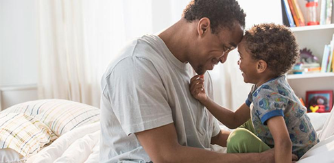 Father and son talking. Credit: Jose Luis Pelaez Inc / DigitalVision via Getty Images