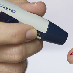 Testing for blood sugar with a fingerprick test