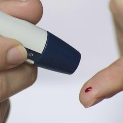 Testing for blood sugar with a fingerprick test