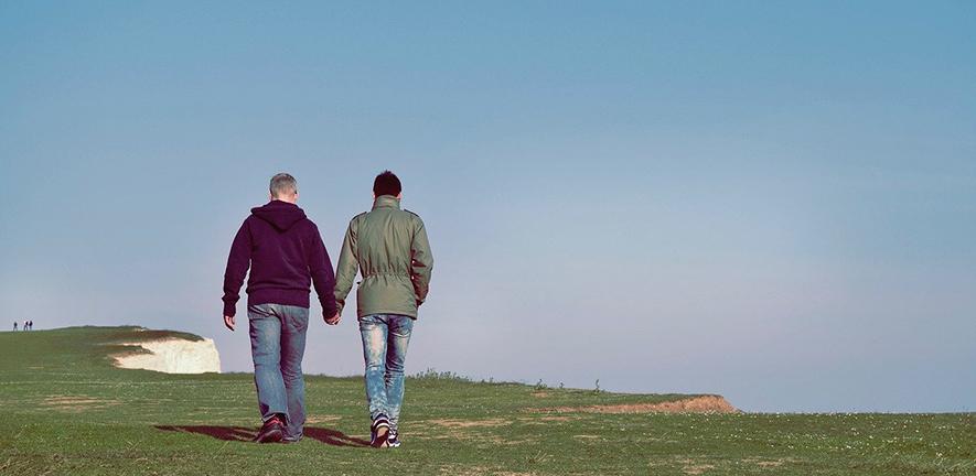 Gay couple walking together Gay couple walking together