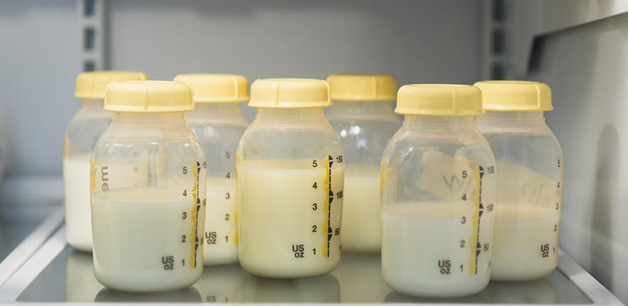 Breast milk in bottles (image: Jamie Grill/The Image Bank)
